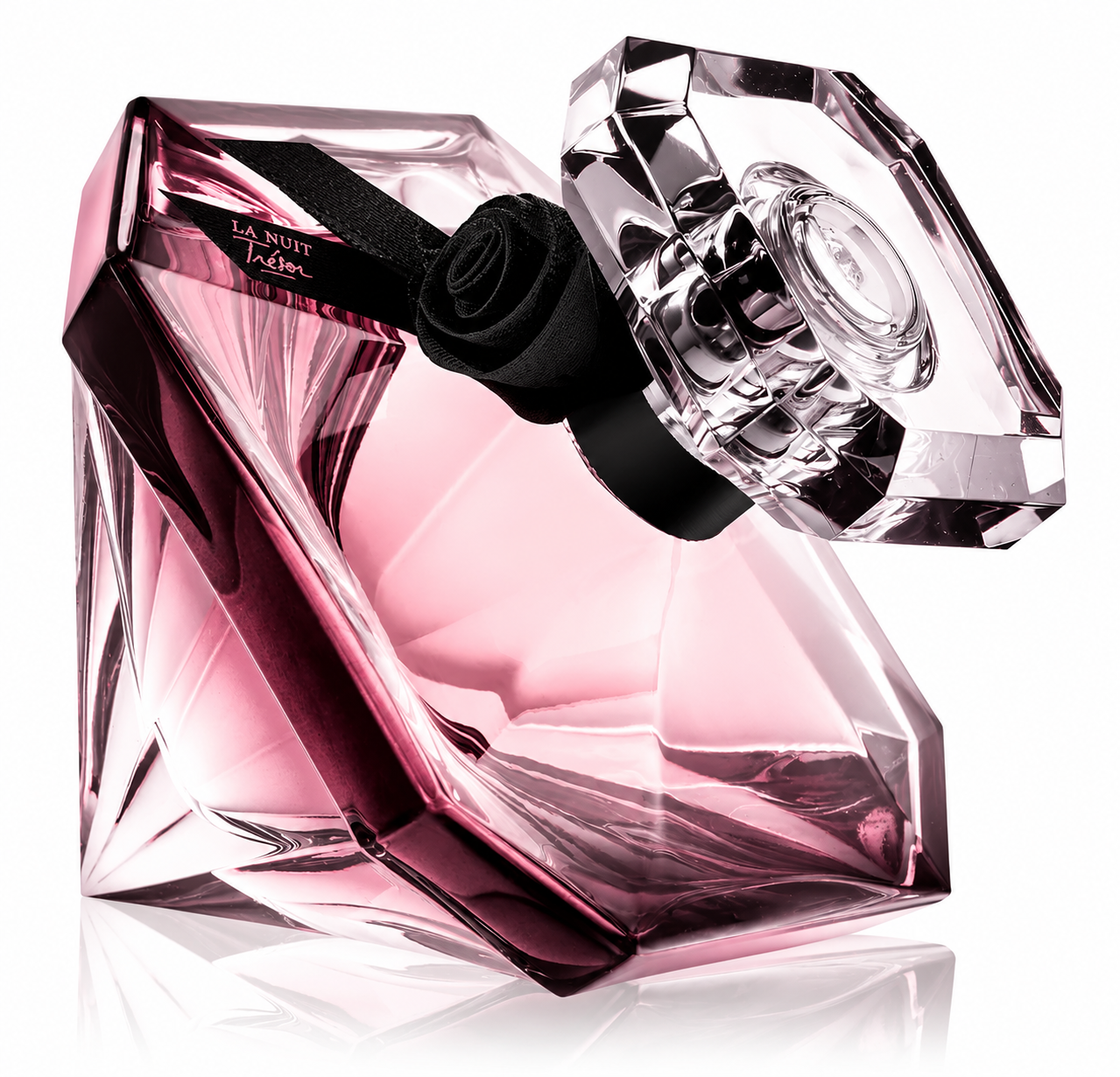 Lancôme La Nuit Trésor perfume bottle isolated on a white background, featuring a faceted diamond-inspired glass design with soft pink fragrance, a crystal-cut cap, and an elegant black rose ribbon around the neck.