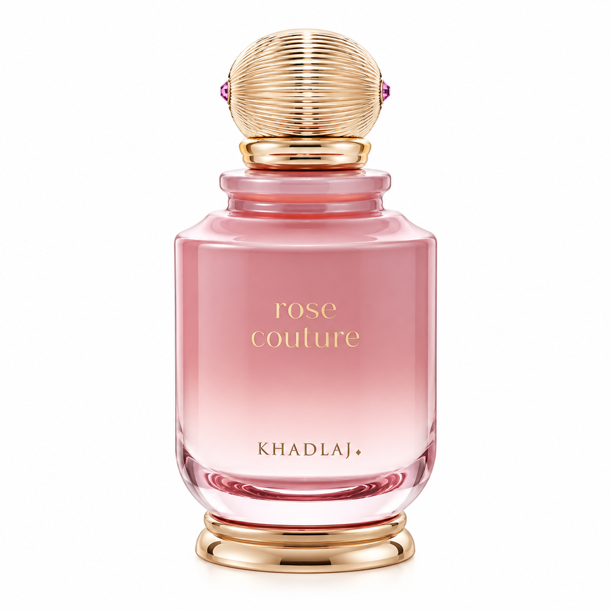 Khadlaj Rose Couture perfume in a soft blush-pink glass bottle with elegant gold detailing, a sculptural ribbed gold cap and refined minimalist branding, presented against a clean white background.